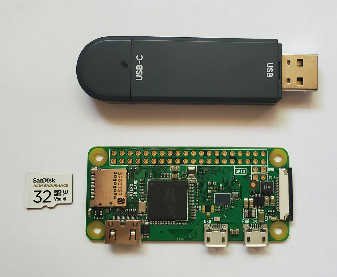 Raspberry Pi 0 W 2017 with an SD card reader and SanDisk 32GB High Endurance card